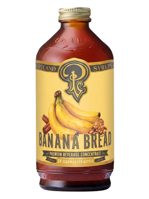 Bottle of Portland Syrup Banana Bread concentrate on a white background
