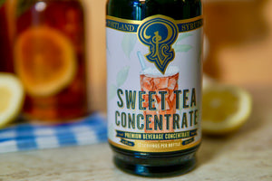 Sweet Tea Concentrate with iced tea and lemons